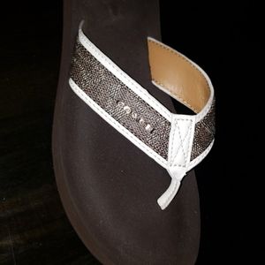Brown coach flip flops